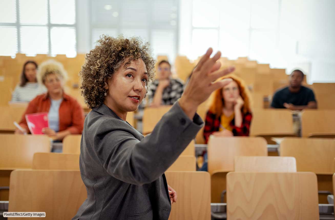 An instructor teaches students who are present in the classroom